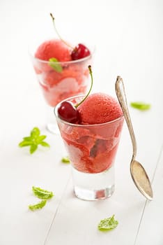 Fresh fruit ice cream sorbet in white bowl.