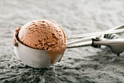 Fresh chocolate ice cream sorbet scoop close up.