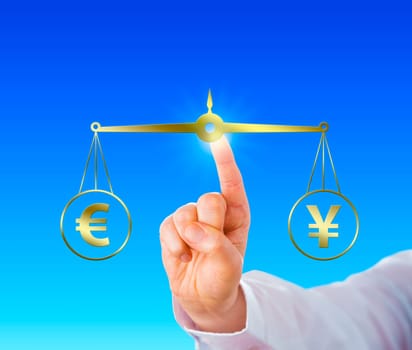 Index finger of a white collar worker is equating the European Union currency sign at par with the Japanese yen symbol on a virtual golden scale over light blue background. Financial metaphor.