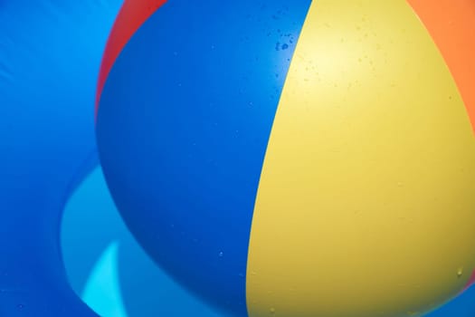 Close-up water polo and bath tyres in the paddling pool