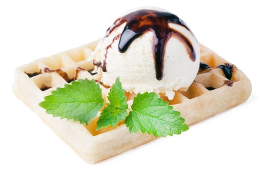 Waffle with vanilla ice cream ball and chocolate sauce