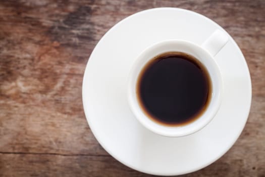 Top view of cup of fresh espresso on table, stock photo