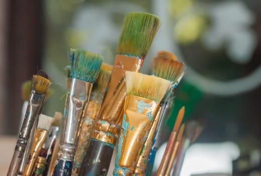 oil paints and brushes can be used as background