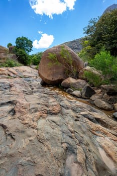 Andringitra national park, Haute Matsiatra region, Madagascar, beautiful mountain landscape with river in valley. Hiking in Andringitra mountains. Sunny day. Madagascar wilderness mountain landscape.