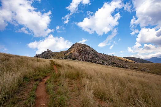 Andringitra national park, Haute Matsiatra region, Madagascar, beautiful mountain landscape with river in valley. Hiking in Andringitra mountains. Sunny day. Madagascar wilderness mountain landscape.