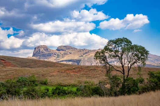 Andringitra national park, Haute Matsiatra region, Madagascar, beautiful mountain landscape with river in valley. Hiking in Andringitra mountains. Sunny day. Madagascar wilderness mountain landscape.