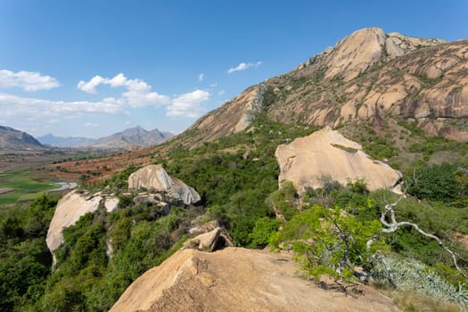 Stunning mountain landscape in the Anja Community Reserve, Madagascar, with vibrant flora and fauna. Nature, travel, adventure, outdoors, hiking, biodiversity. Madagascar wilderness mountain landscape