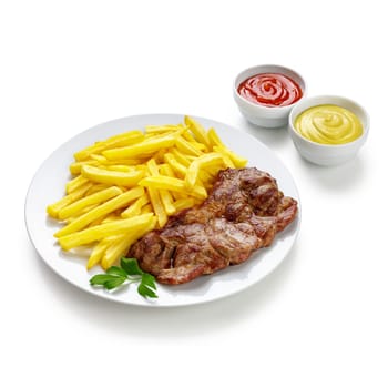 Grilled steaks and french fries on white plate with ketchup and mustard bowl