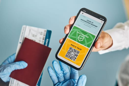 Digital covid certificate. Covid vaccination digital pass. Woman passenger holding digital medical pass on her mobile phone, passport and airplane ticket. Traveler showing digital covid test result as medical pass for travel during covid-19 pandemic