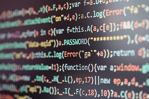 Hacker using computer, smartphone and coding to steal password and private data remotely from car. Screen displaying program code, website development, application building, password and private data. Access to the information, confidential personal data. Breaking protection. Stealing identity. Software cracking