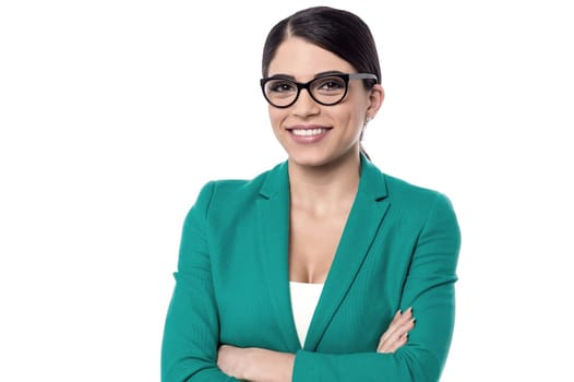 Confident business woman posing over white