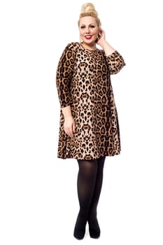 Trendy woman giving a stylish look over white