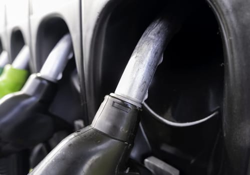 Detail of pumps to refuel gasoline and diesel in cars