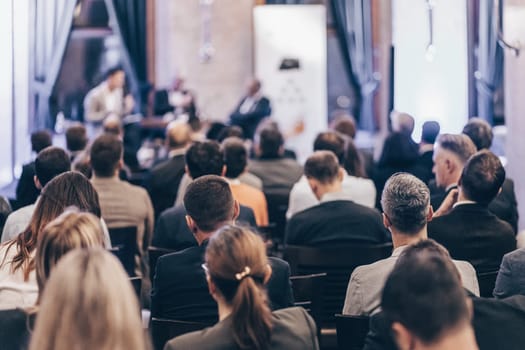Round table discussion at business convention and Presentation. Audience at the conference hall. Business and entrepreneurship symposium.