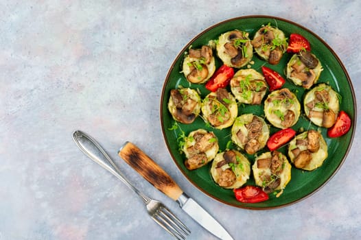 Diet food-roasted zucchini with mushrooms. Baked courgette. Copy space