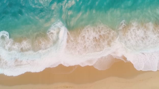 This stunning aerial photograph captures the beauty of the ocean waves and the beach from a top-down perspective. The crystal clear blue waters contrast with the golden sand, creating a beautiful natural background for summer vacation holidays.