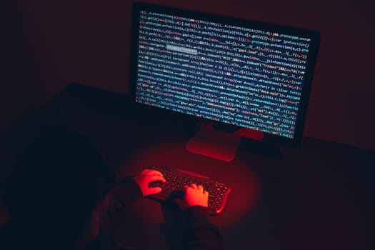 Man using computer and programming  to break code. Cyber security threat. Internet and network security. Stealing private information. Person using technology to steal password and private data. Cyber attack crime