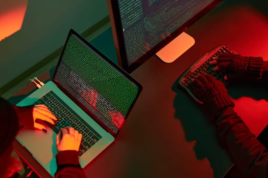 Anonymous people using computer and programming to break code. Cyber security threat. Internet and network security. Access to private information. Anonymous hackers using technology to access to password and encrypted data. Cyber attack