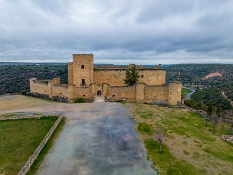 Medieval castle of Pedraza built on the esplanade of the fields of Castile, Segovia, Spain.