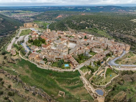 Medieval walled city of Pedraza in Segovia general panoramic aerial view south east