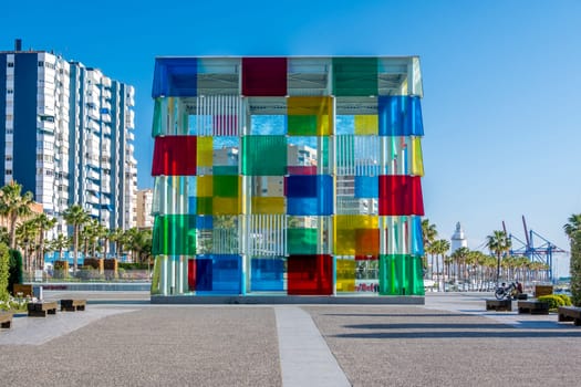Malaga, Spain, April 2023: View on the Centre Pompidou colorful cube architecture by Daniel Buren. Location: Marina of Malaga, Spain