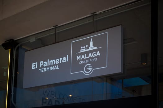 Malaga, Spain, April 2023: View on the El Palmeral Terminal sign at Malaga Cruise Port.