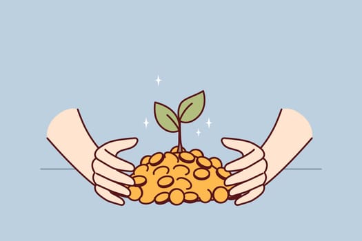 Hands with gold coins and growing tree symbolizing dividends on accumulated capital and profitable investment. Gold with green leaves as metaphor for financial literacy and ability to invest or trade