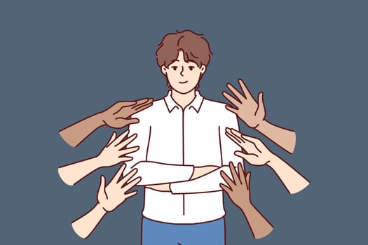 Popular business man beside many hands wanting to touch idol, for concept of corporate training or team building activities. Proud guy in business clothes are popular among colleagues