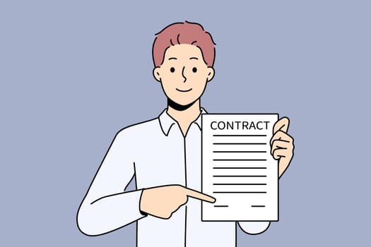 Smiling man show place to sign agreement