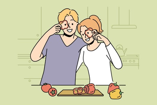Smiling couple cutting vegetables at home kitchen preparing food together. Happy man and woman cooking on weekend. Cuisine and meal preparation. Vector illustration.