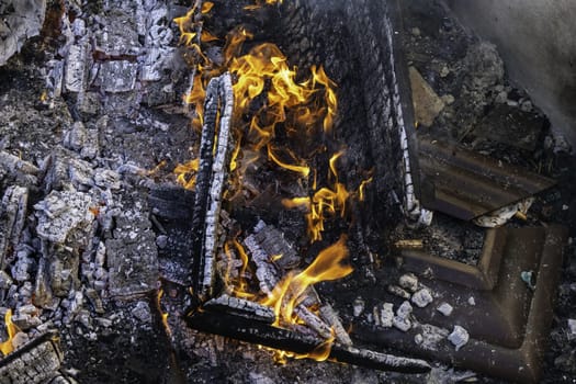 Detail of wood burning with fire and flames, destruction
