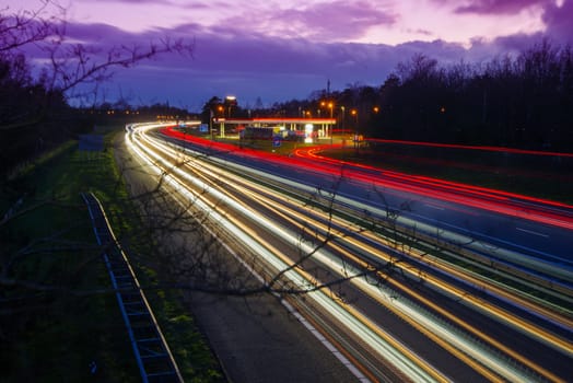 OLDENZAAL, NETHERLANDS - MARCH 24, 2023: Long exposure shot of traffic on the E30 highway from Amsterdam to Berlin.