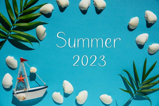 Flat Lay With English Text Summer 2023. Turquoise Or Blue Background With Maritime Decoration Like Boat, Shells And Palm Leaf.