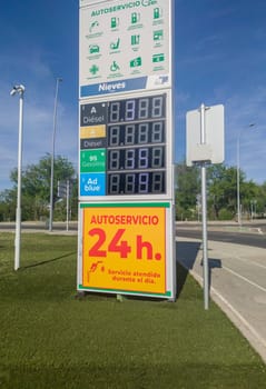 Merida, Spain - April 17th, 2023: Price board outside spanish petrol station. High petrol prices concept