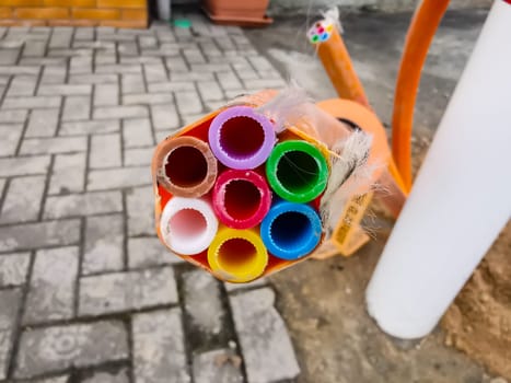 Plastic cable for fiber optic lines on construction site