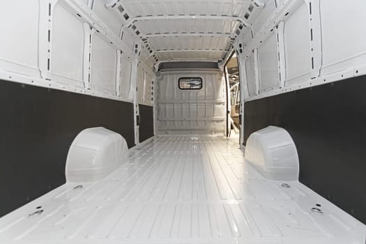 Empty long white delivery van transport
