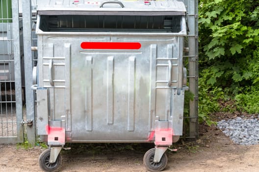 Waste containers (recycling containers) on a road