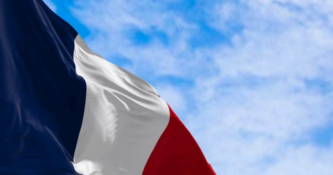 The national flag of France waving in the wind on a clear day. Tricolor of blue, white and red vertical stripes. EU state member. 3d illustration render. Fluttering textile