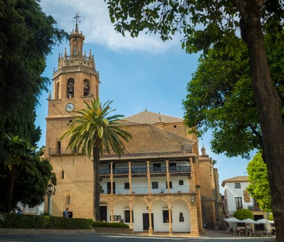 Ronda, Spain, April 2023: View on the Iglesia de Santa Maria la Mayor, Catholic church with gothic mudejar architecture in Ronda