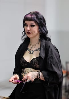 Krakow, Poland -  June 11, 2022: Unidentified  participant at 15th Tattoofest Convention in Cracow. One of the most prestigious tattoo festivals.