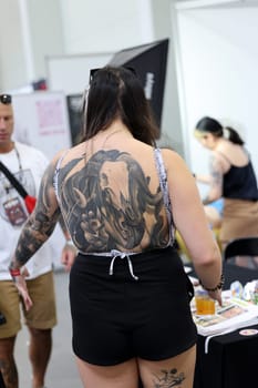 Krakow, Poland -  June 11, 2022: Unidentified  participant at 15th Tattoofest Convention in Cracow. One of the most prestigious tattoo festivals.