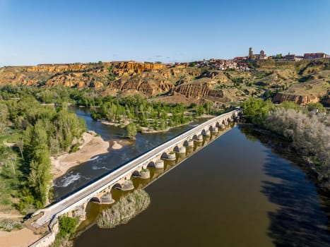 Aerial view of the main Roman bridge in the city of Toro Province of Zamora Spain, Panoramic view of the city in the background