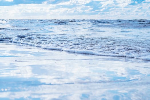 All shades of blue. Sea expanses under sky with white clouds.Meditation and relaxation. Interior paintings. Wonderful moments of life. Tourism and travel. Splendor of nature. Rest and pleasure.
