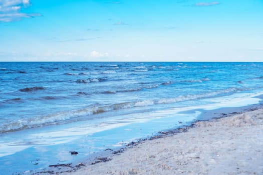 Morning calm seascape, sky, waves and sand. Meditation and relaxation. Breath of sea. Wonderful moments of life. Tourism and travel. Splendor of nature. Rest and pleasure. Enjoying beautiful.