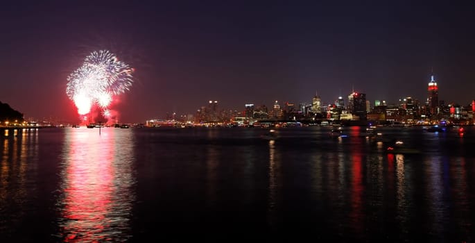 NEW YORK - JULY 4: The largest  fireworks in the country displayed over the Hudson River - the Macy's 4th of July fireworks on July 4, 2010 in New York City.