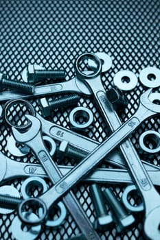 Set of chrome wrenches on steel surface. Mechanic tools for maintenance. Hardware tools to fix. Technical tools background
