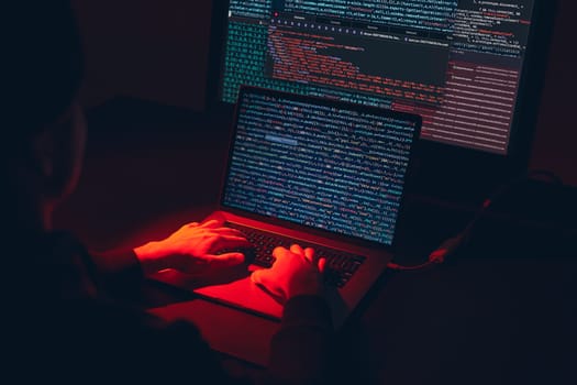Man using computer and programming  to break code. Cyber security threat. Internet and network security. Stealing private information. Person using technology to steal password and private data. Cyber attack crime