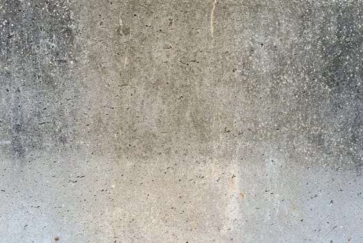 Old weathered concrete texture with small holes and lichens