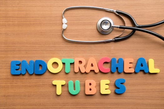 Endotracheal tubes colorful word with stethoscope on the wooden background