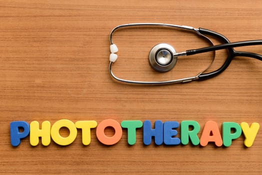 phototherapy colorful word on the wooden background